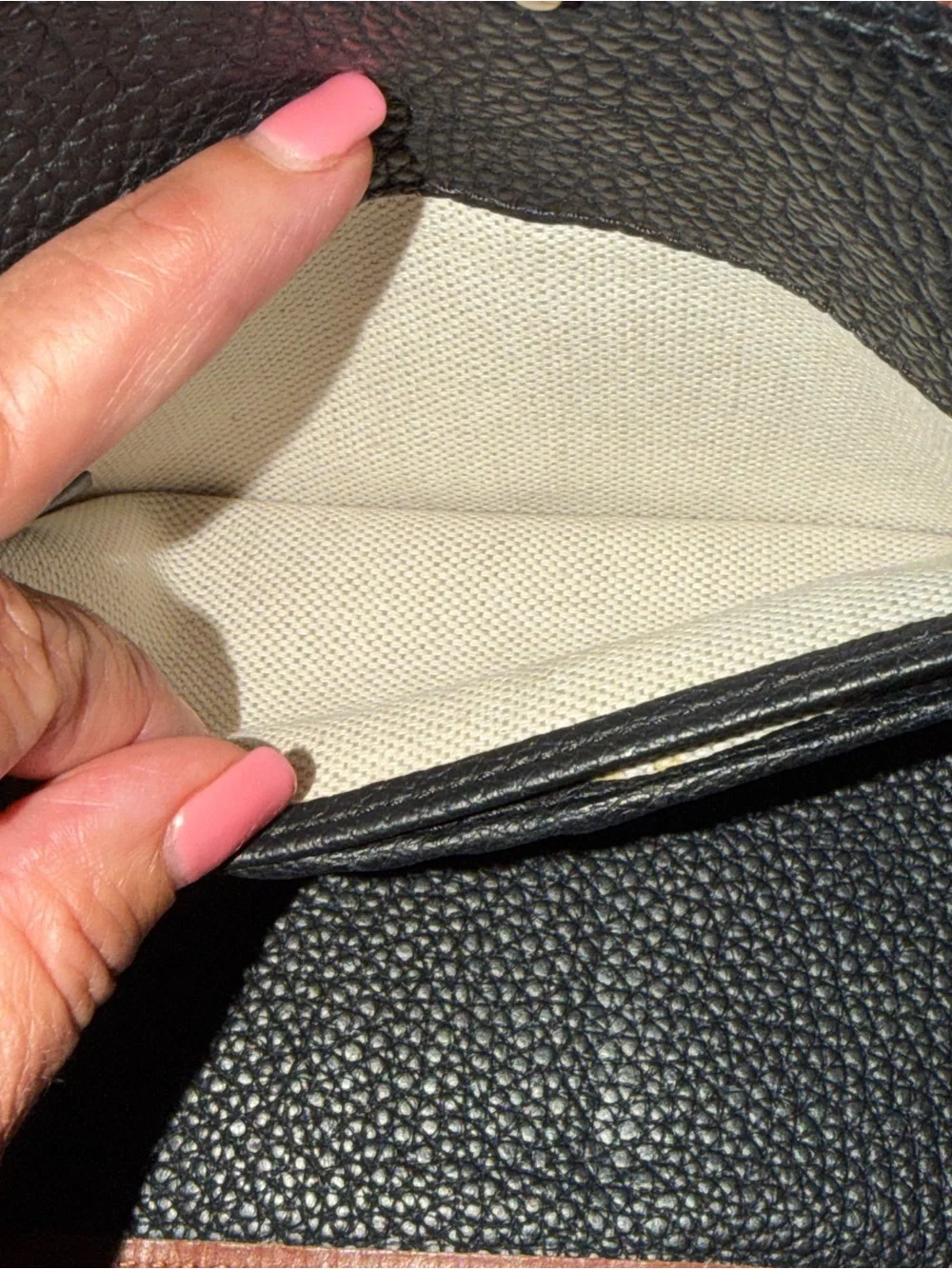 Dooney & Bourke Black Pebbled Leather Wallet with Brown Trim Patch